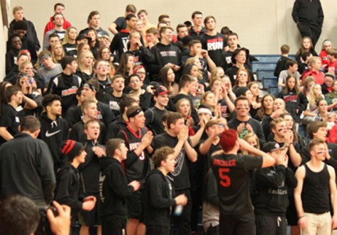 The Northwest Student Section cheers on the team during the game.