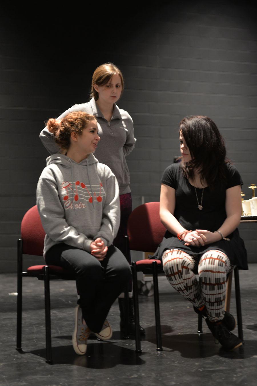 Senior Sophi Epstein, senior Genna Barner, and junior Kate Romkee rehearse a scene where Elaine is angered by the Aunt's belief that they are murdering people out of mercy.