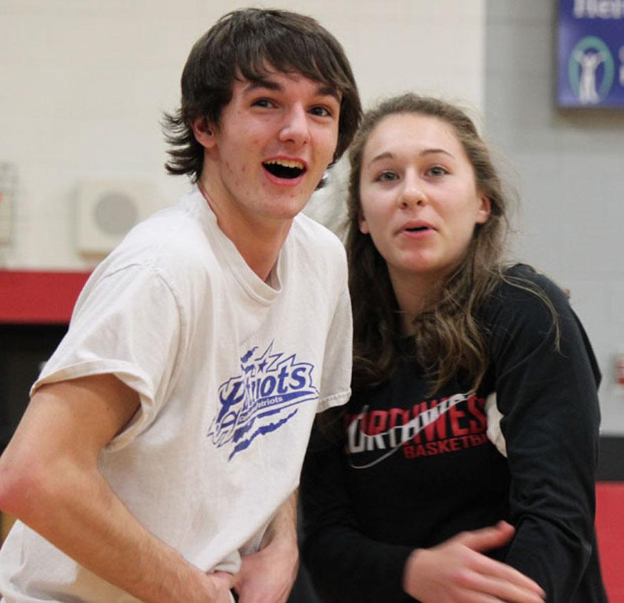 Juniors Cyle Risinger and Carsyn Sleight watch how the teacher team unfreezes their t-shirts using body heat.