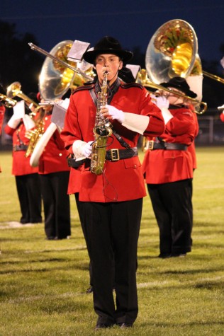 Senior Alec Richmond plays a solo during half time