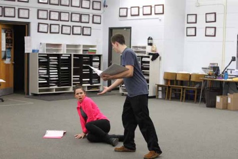 Senior Olivia White and Brian Lewis act our their parts for the musical Beauty and the Beast