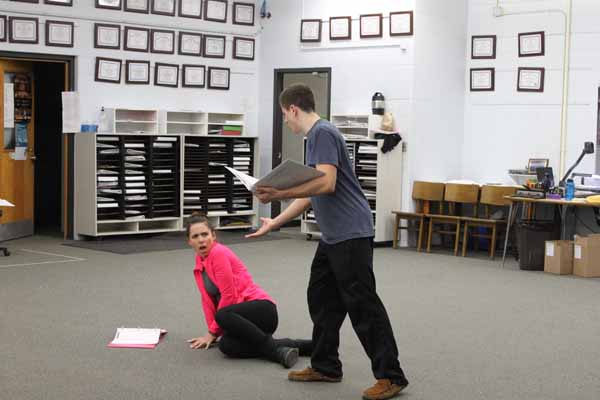 Senior Olivia White and Brian Lewis act our their parts for the musical Beauty and the Beast 