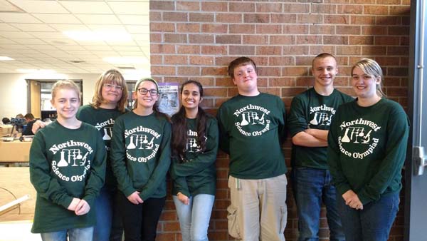 (From left to right) Sophomore Jazmen Bartolovich, Science Olympiad Coach Rhonda Drumm, seniors Allegra Ward, Aradhya Agnihotri, and Joseph Kurtz, sophmore George Irwin, and junior Nicole Bartolovich.