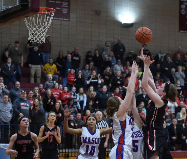 Senior Lexie Khon scores the winning shot.