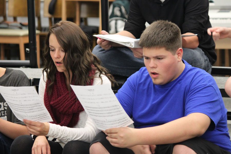 Seniors Kelsy Lopes and Jerod Parrett sight read during Vocal Dimension.