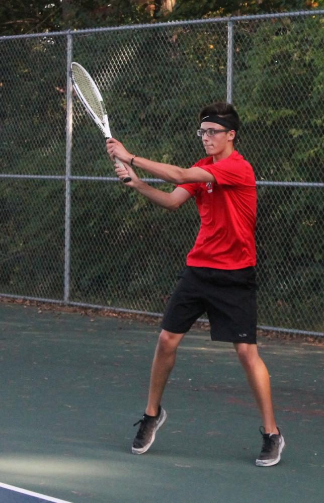 Senior Sam Hibbs plays as singles one for the Boys Tennis team. Hibbs loses against Lumen Christi 0-6 and 0-6. 