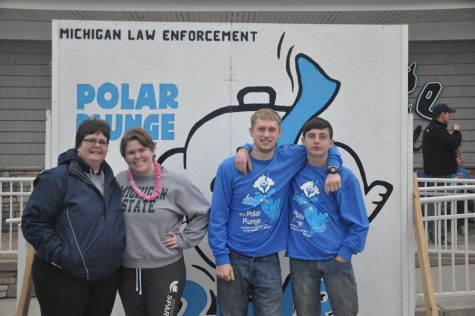 Students participate in Clark Lake Polar Plunge