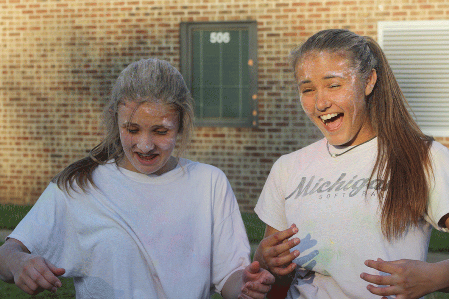 Freshman Chloe Cooper and Grace Pilacynski show their initial reaction to their first color war ever