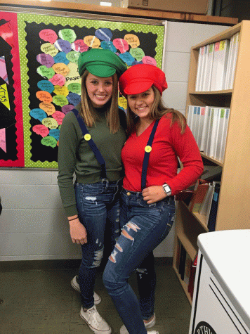 Junior Mackenzie Ruba and Chelsea Devolder dressed as Mario and Luigi.