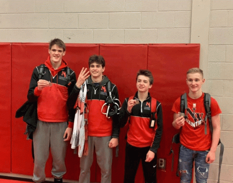 Four wrestlers advance to regionals