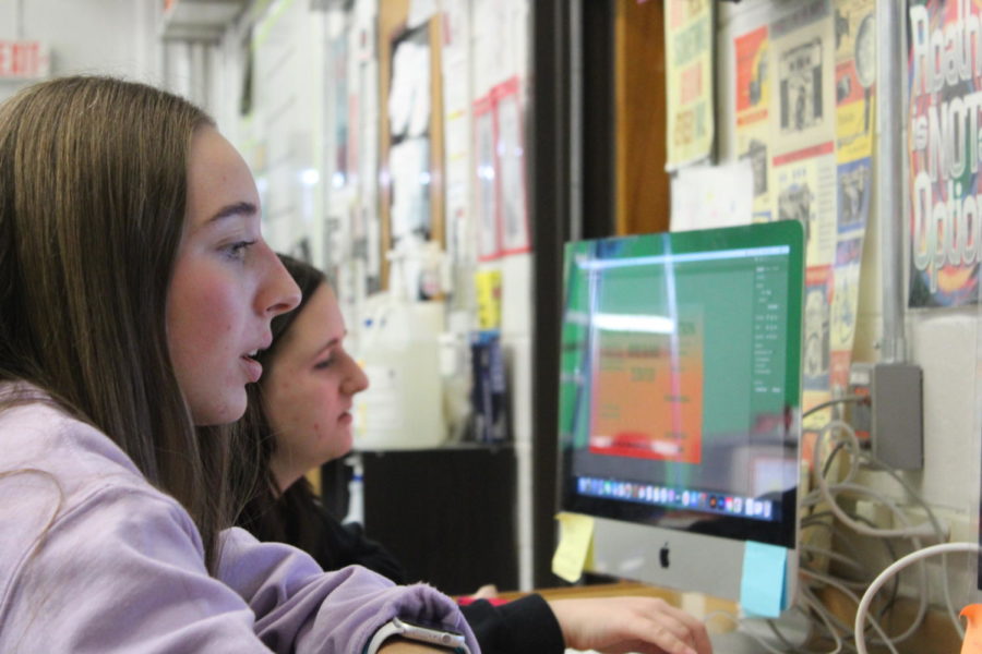 Abby Sczykutowicz (left) and Kellie Fruend (right) working on airing their latest broadcasting show. 