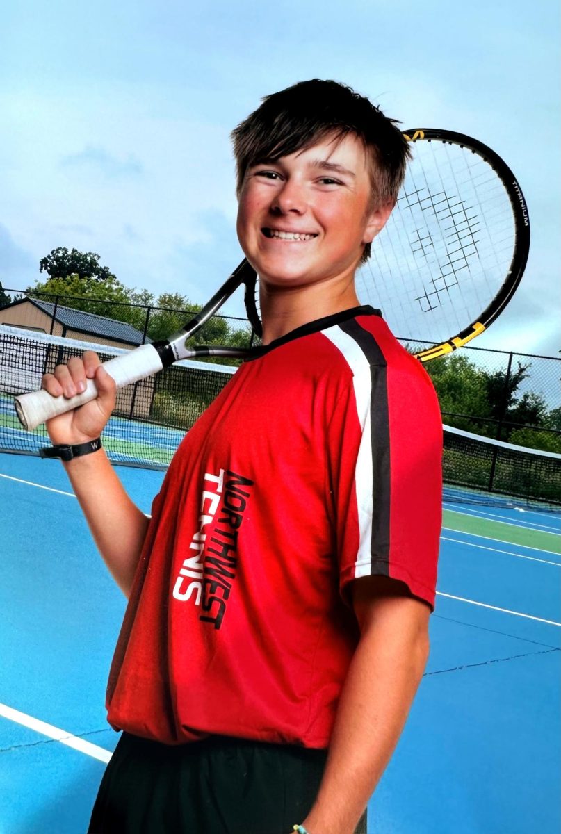 Jaxon Gerding posing for his official tennis photo. 