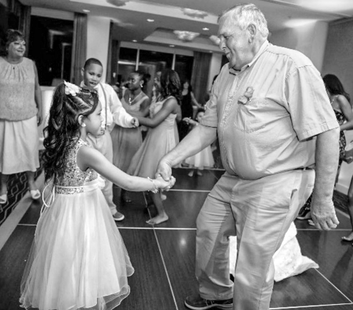 Worthey and her grandfather dancing.