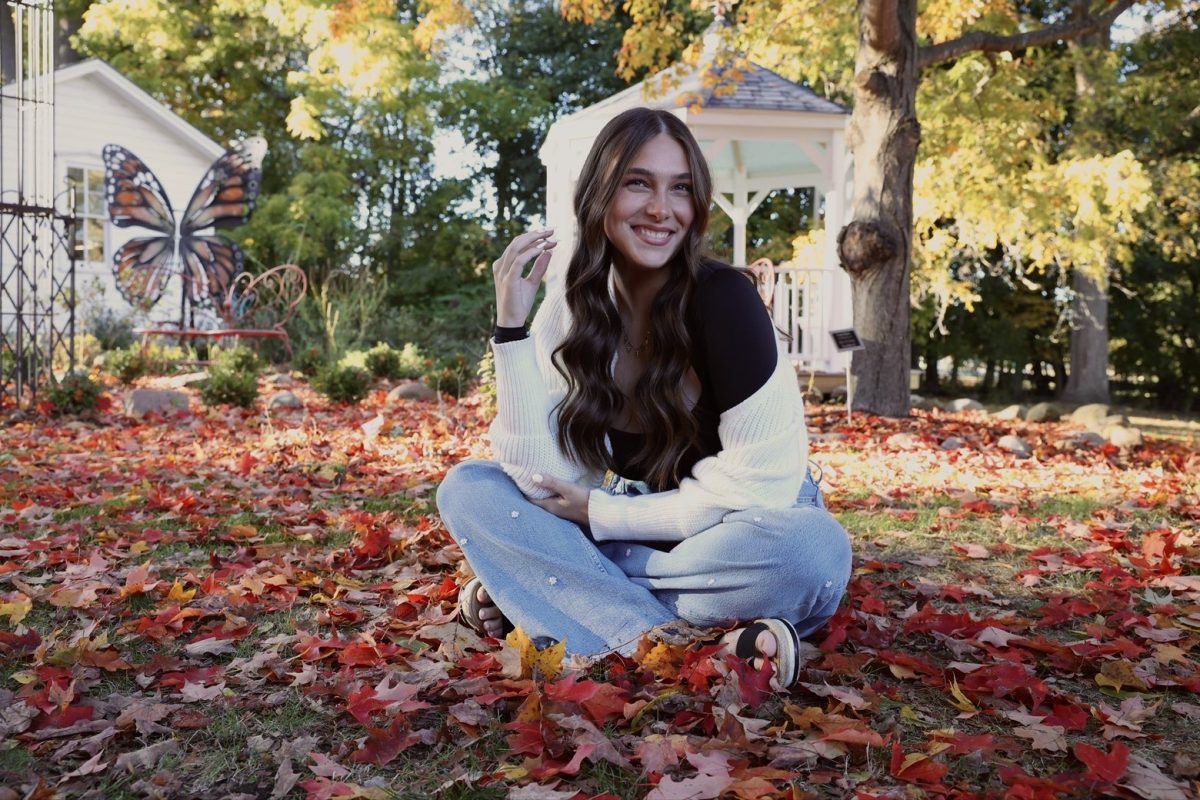  Gwenyth Terry sitting in a bed of leaves